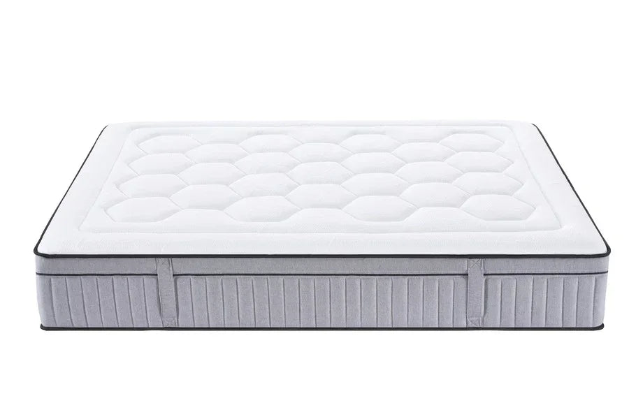 Double mattress with hexagonal quilted top and grey fabric sides, side view