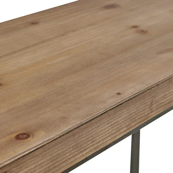 Light wood dining table with metal legs, close-up of tabletop and edge detail