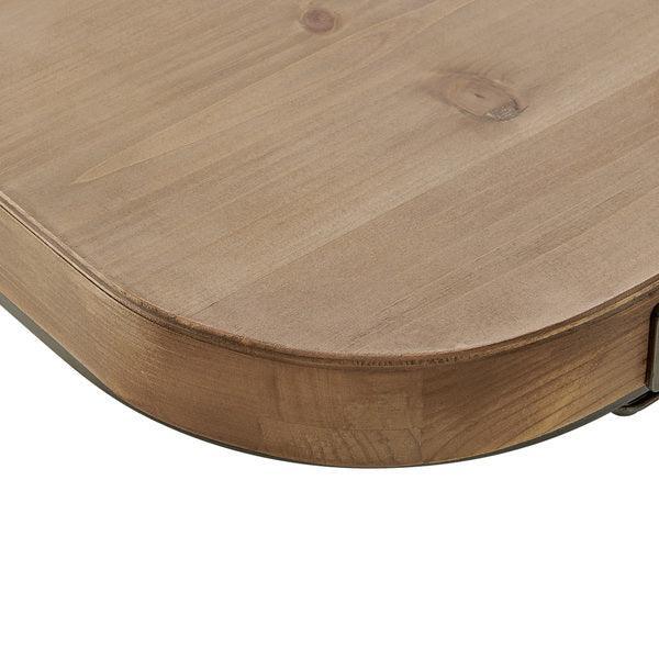 Closeup of round wooden dining table edge with smooth natural finish