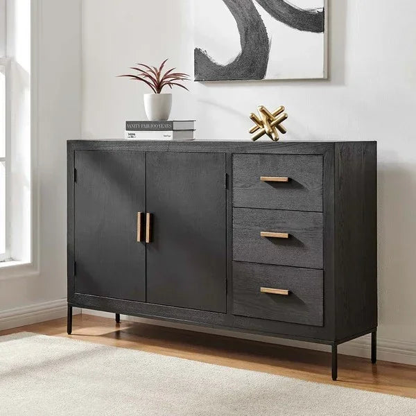 Black wood sideboard with brass handles, three drawers and two doors in modern living room