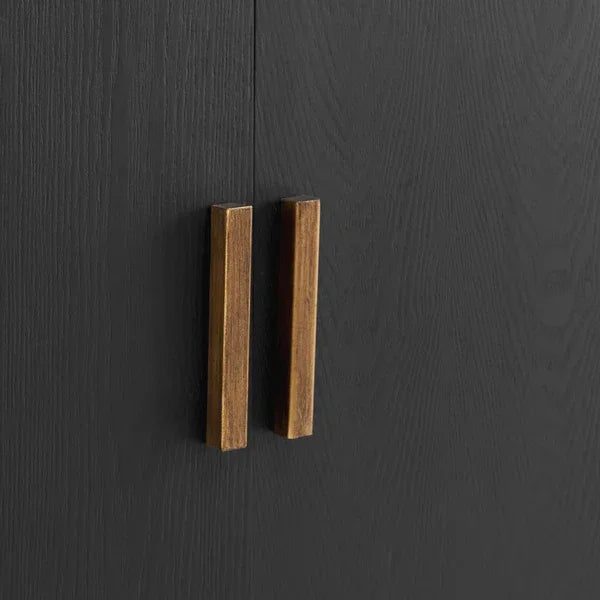 Black wood cabinet with brass handles front view