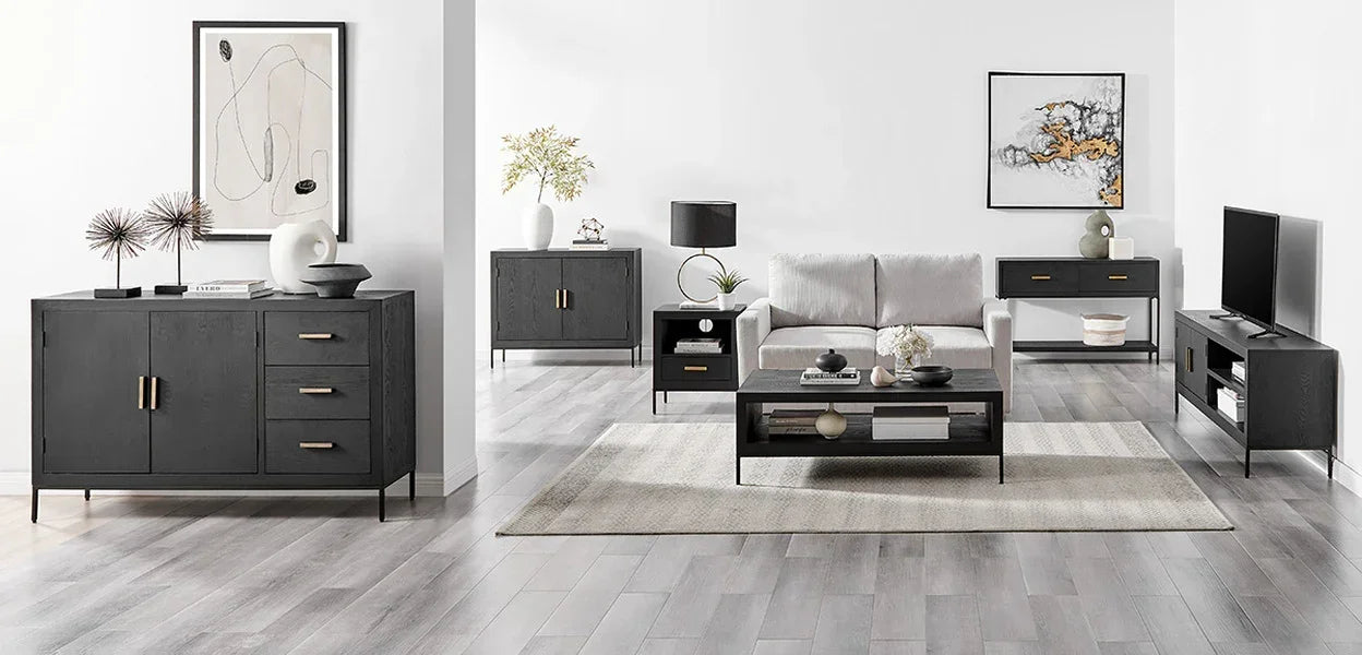 Modern living room furniture set in black wood with grey sofa and TV unit on light flooring