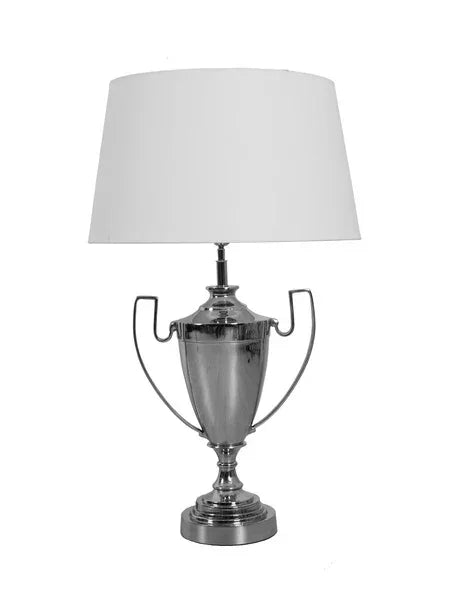 Silver table lamp with trophy-shaped metal base and white fabric lampshade