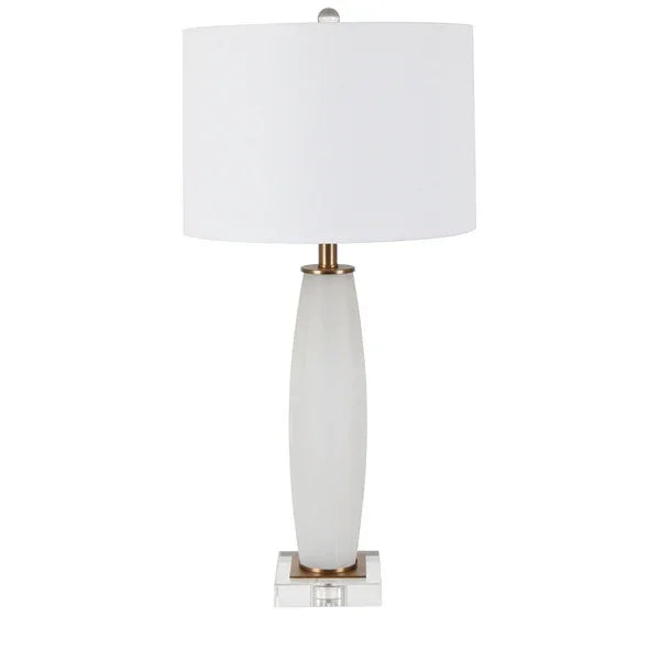 White ceramic table lamp with cylindrical base and white fabric lampshade