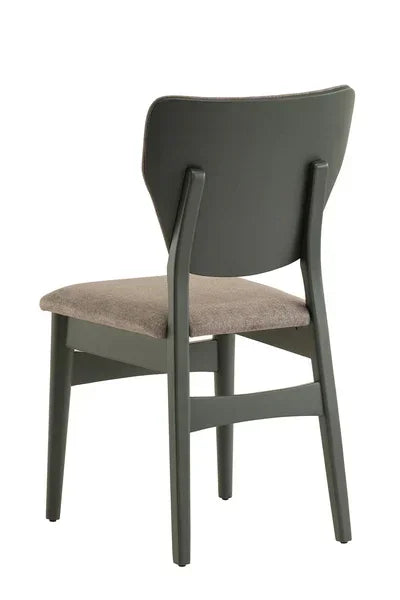 Grey wooden dining chair with padded fabric seat shown from the back