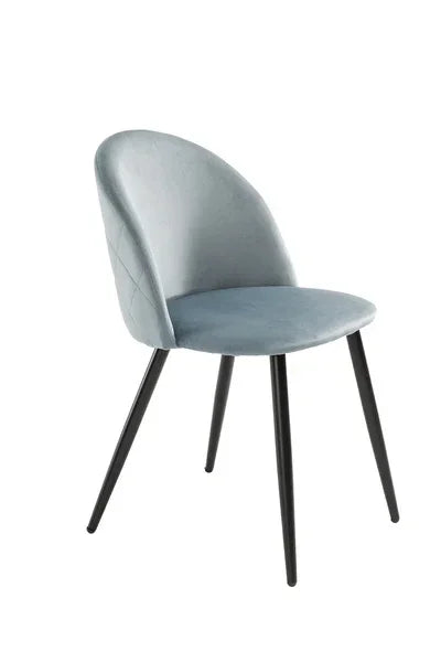 Light grey velvet dining chair with curved backrest and black metal legs
