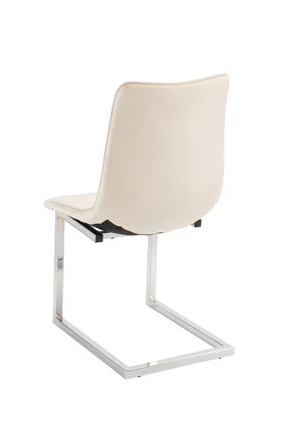 Beige dining chair with chrome cantilever base, rear angle view