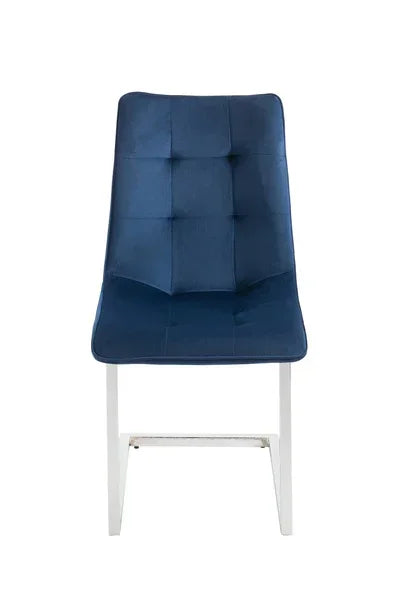 Blue velvet dining chair with white metal legs, front view