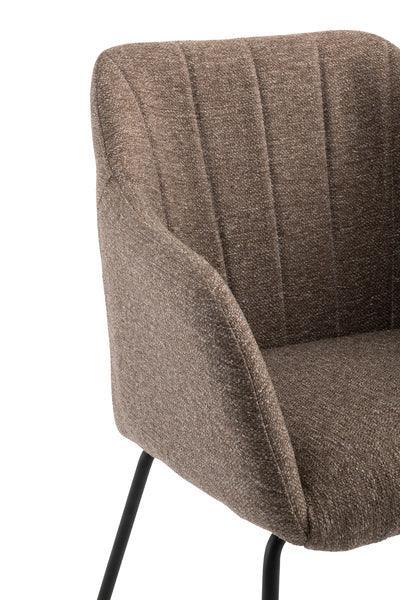 Brown fabric dining chair with stitched backrest and black metal legs, side angle view