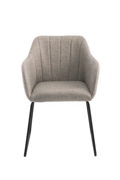 Beige fabric dining chair with black metal legs and padded seat, front view