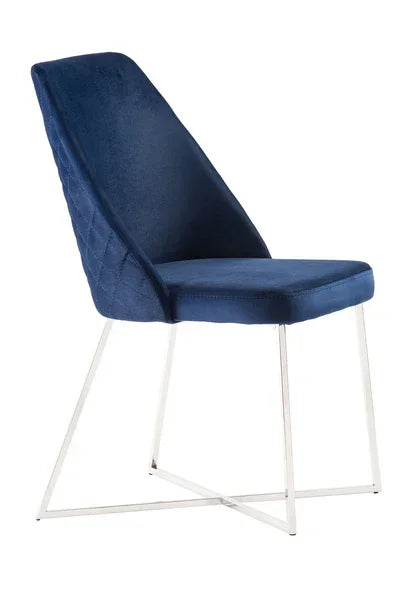 Navy blue velvet dining chair with quilted back and slim metal legs, side angle view