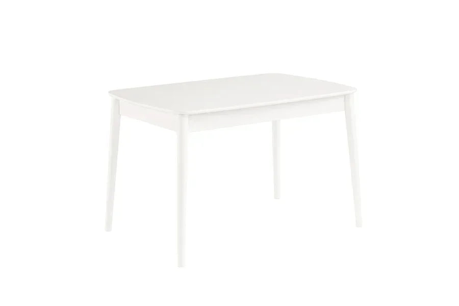 White wooden dining table with rectangular top and four tapered legs