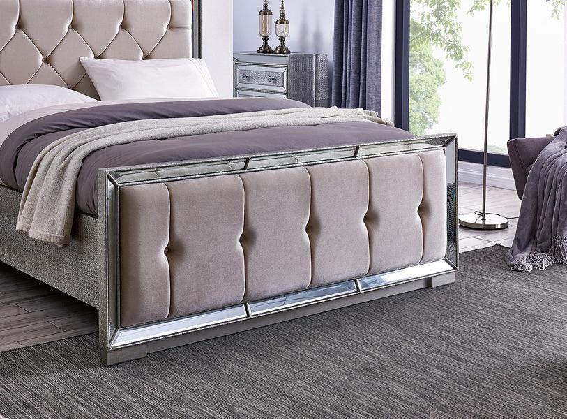 Upholstered bed with mirrored frame, tufted headboard and footboard in modern bedroom