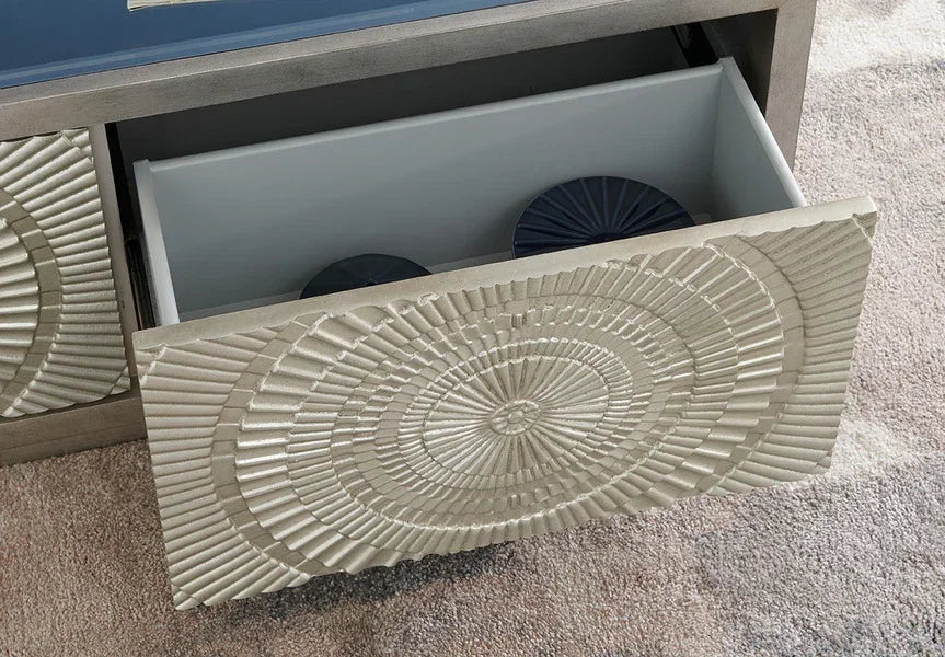Textured drawer front with geometric pattern on storage cabinet, partially open on carpet