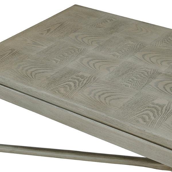 Light oak coffee table with square parquet pattern top and wood grain finish