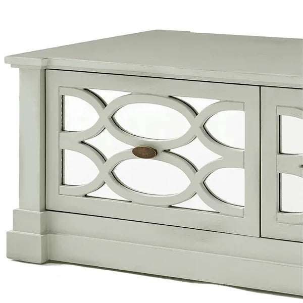 Light grey wooden cabinet with mirrored door and decorative lattice front panel