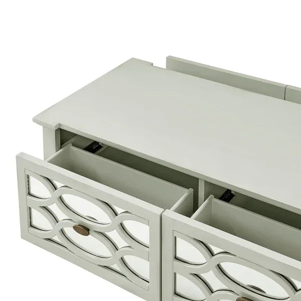 White wooden chest of drawers with mirrored panel fronts and silver handles