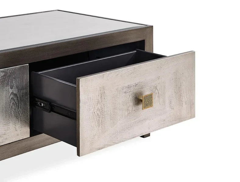 Wood coffee table with metallic front drawer open, showing storage space