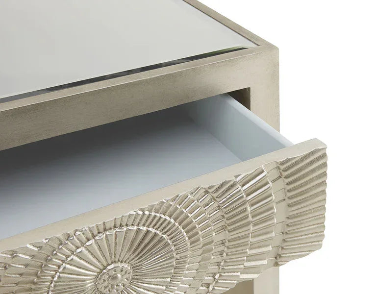 Silver bedside table with mirrored top and textured front open drawer