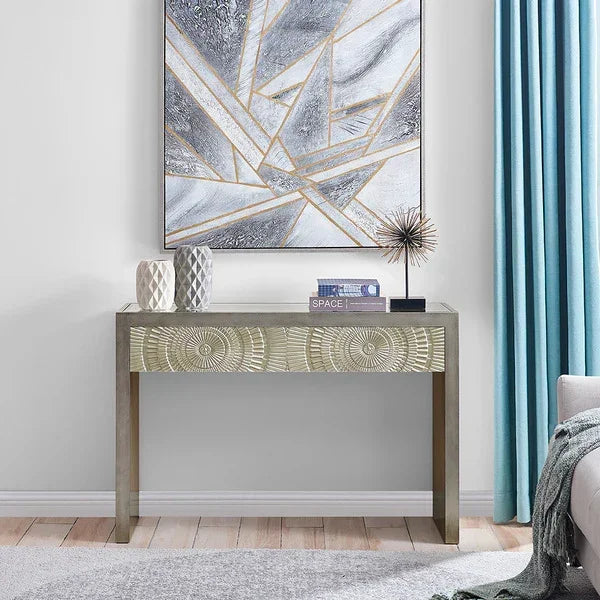 Wooden console table with gold carved drawer front, modern decor and art in living room