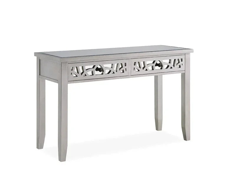 Silver console table with mirrored top and decorative cut-out drawer fronts