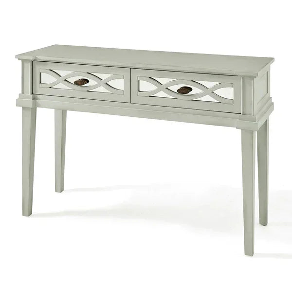 Grey console table with two mirrored drawers and carved geometric detail