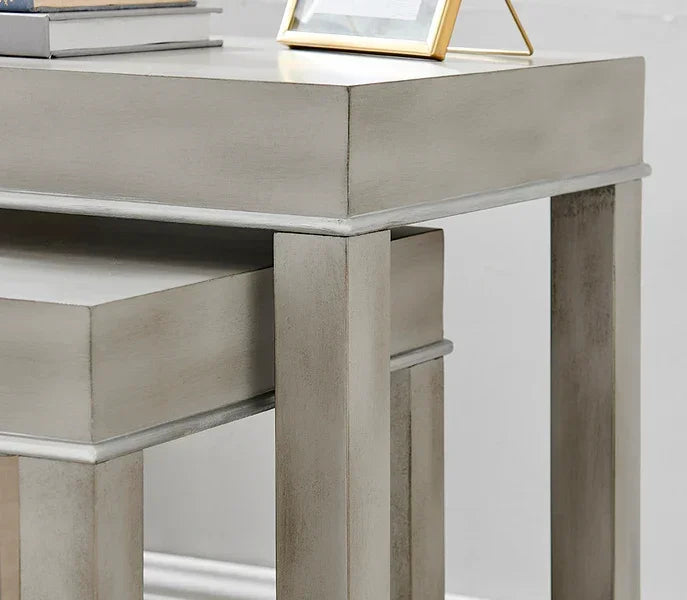 Set of two grey wooden nesting tables with square legs and matte finish