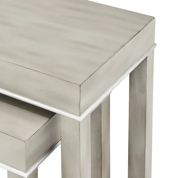 Light grey wooden nesting tables with square edges and modern design
