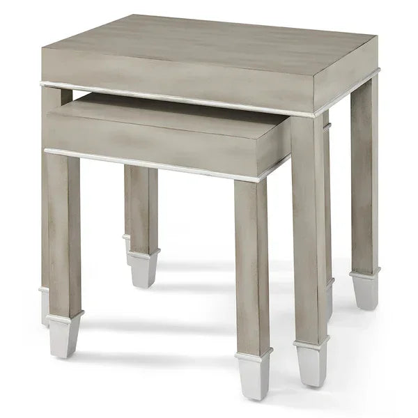 Light grey wooden nesting tables with square legs and white trim accents