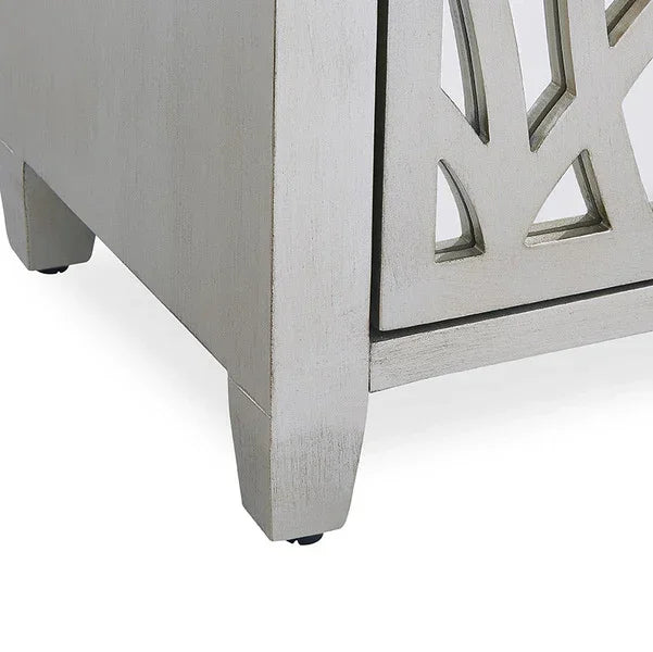 Silver wooden cabinet leg with carved geometric panel detail