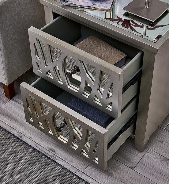 Mirrored bedside table with open drawers showing geometric design and fabric storage