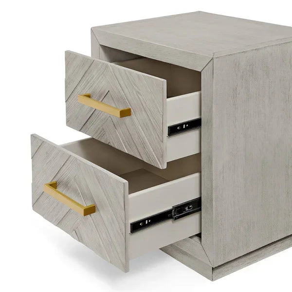 Light wood bedside table with two drawers and gold handles, drawers open to show storage