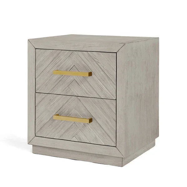 Light wood bedside table with two drawers and gold handles, angled front view