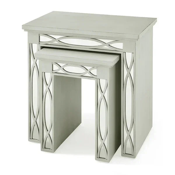 Grey mirrored nest of tables with geometric frame detailing, stacked together