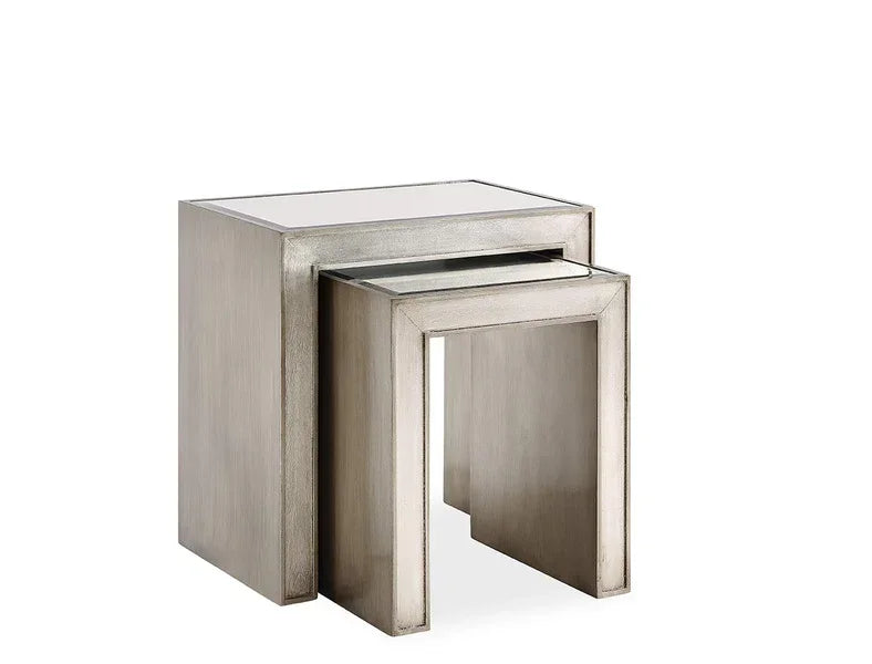 Silver metal nesting tables with mirrored tops, modern square design, set of two side tables