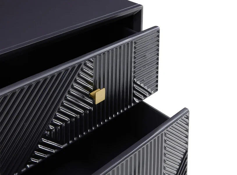 Black drawer chest with textured front and gold square handle, close-up of open drawers