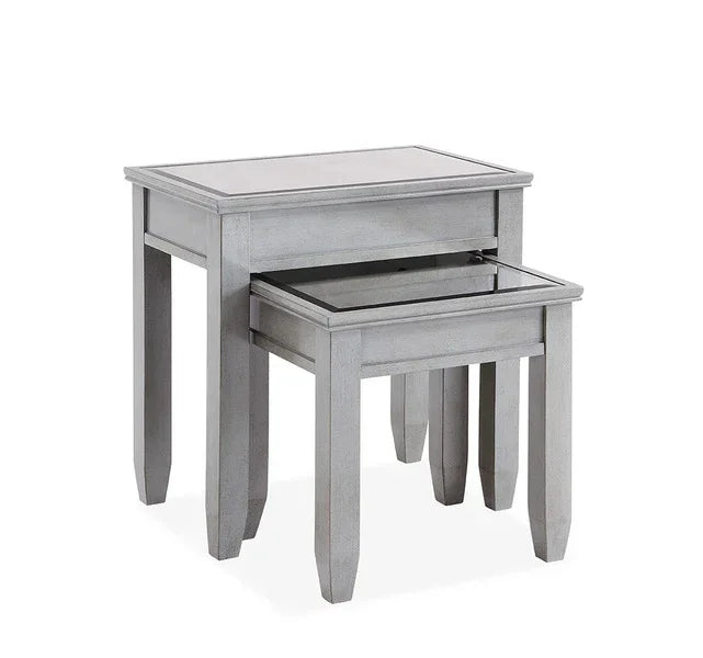 Grey wooden nest of tables with glass tops, set of two stacked together