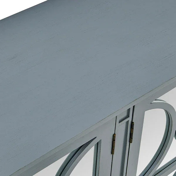 Grey wooden console table top and mirrored cabinet doors with brass hinges