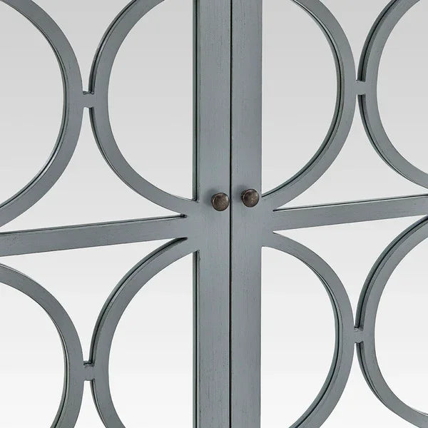 Grey wood cabinet doors with circular overlay detail and round metal handles