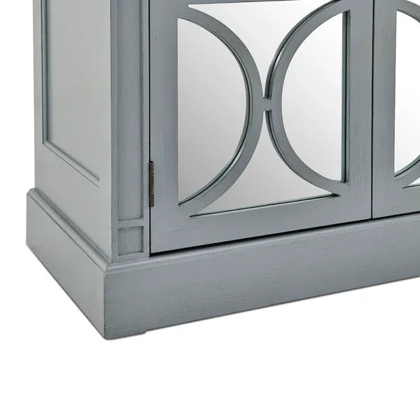 Grey sideboard cabinet with mirrored front panels and circular wood detailing