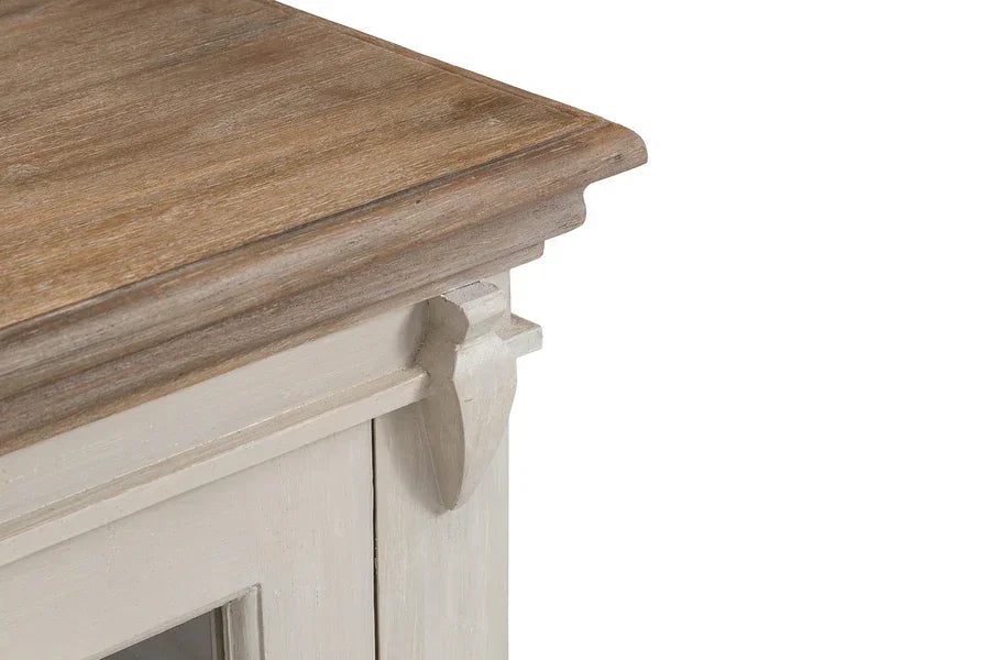 Close-up of wooden cabinet top with natural finish and white painted frame