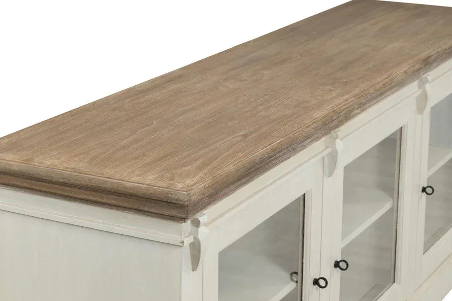White sideboard with glass doors and natural wood top, close view of cabinet detail