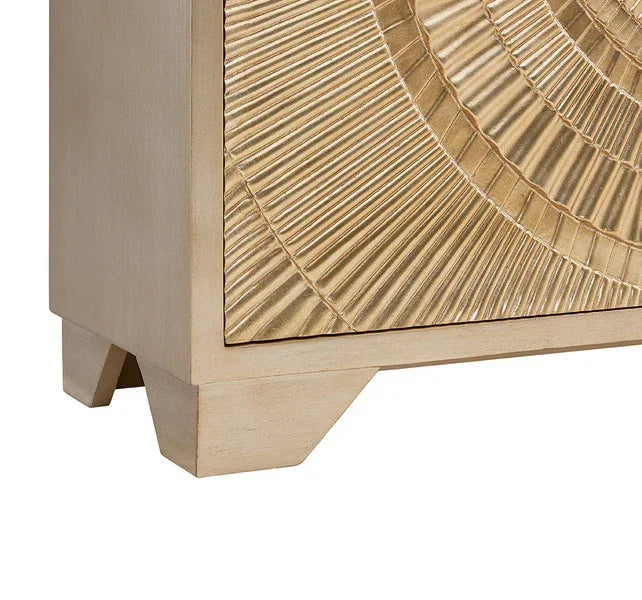Gold textured sideboard with sunburst pattern and light wood legs, close-up view