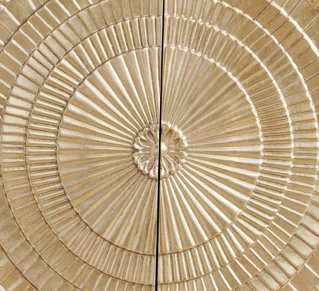 Gold textured cabinet doors with circular sunburst pattern