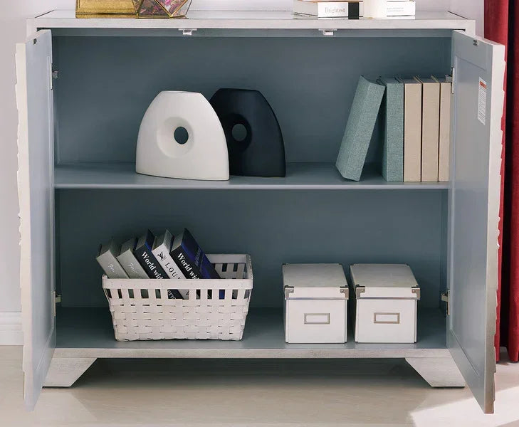 Modern storage cabinet with open doors, books, decorative vases, and storage boxes inside