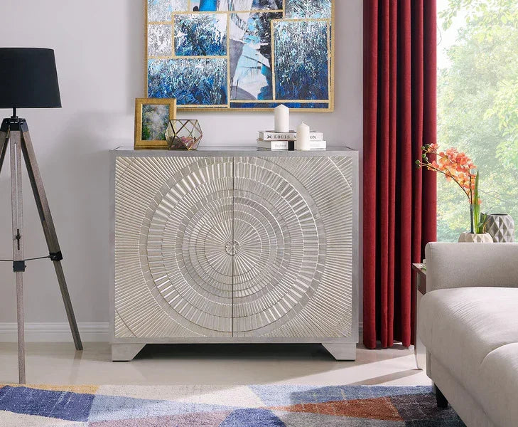 Silver sideboard cabinet with geometric pattern in modern living room setting