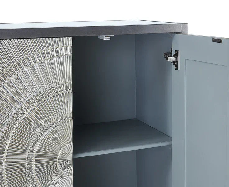 Grey wood sideboard cabinet with open door and silver embossed sunburst pattern
