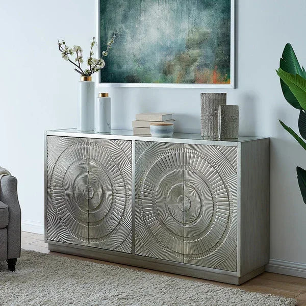 Silver sideboard with geometric pattern and decorative vases in modern living room