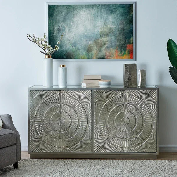 Silver sideboard cabinet with geometric patterns in modern living room setting