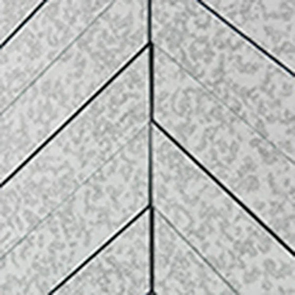 Chevron pattern wood furniture surface in grey with textured finish